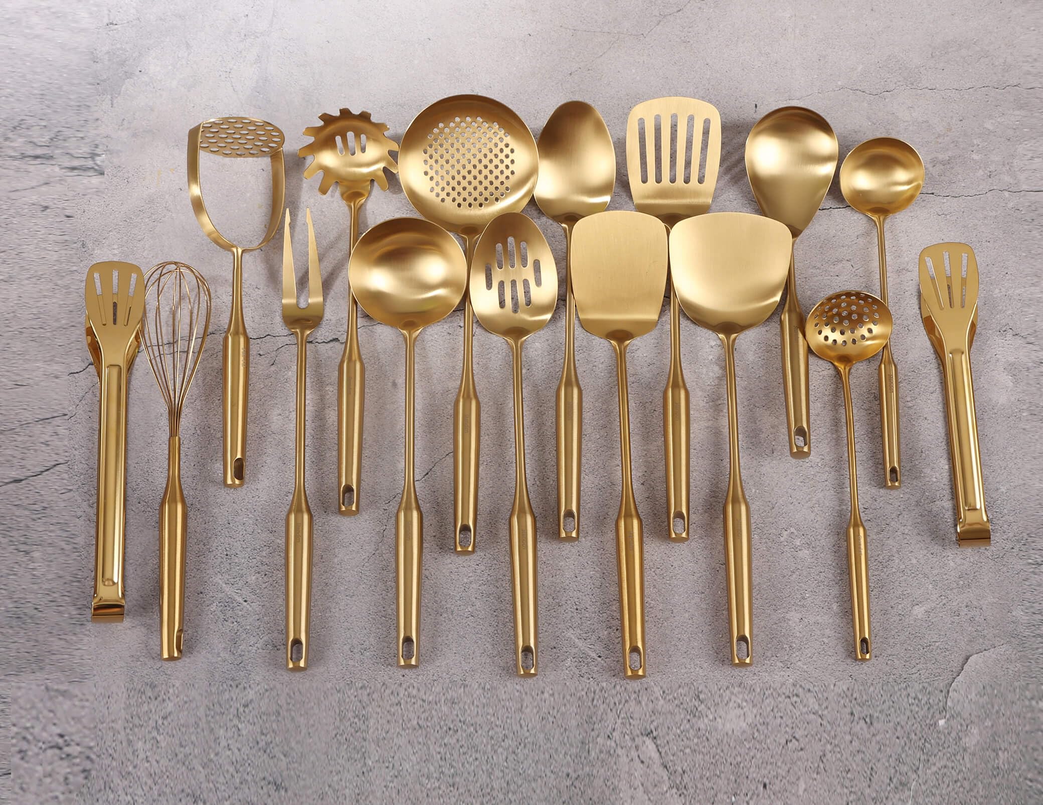 Standcn gold whisk designed for smooth mixing and batter aeration in gourmet cooking