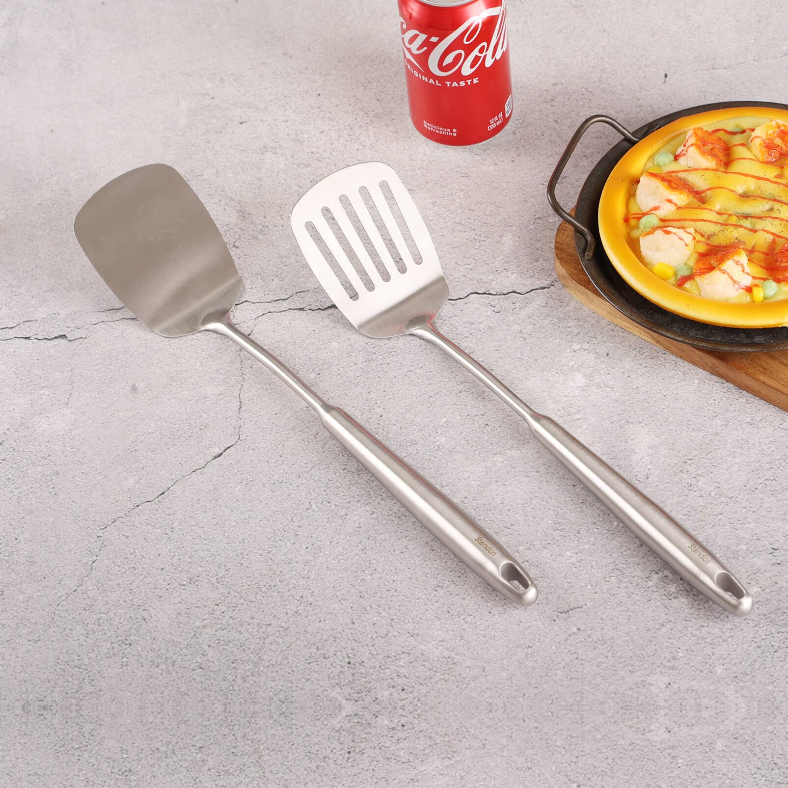 Standcn grease-drain slotted spatula reduces mess during cooking