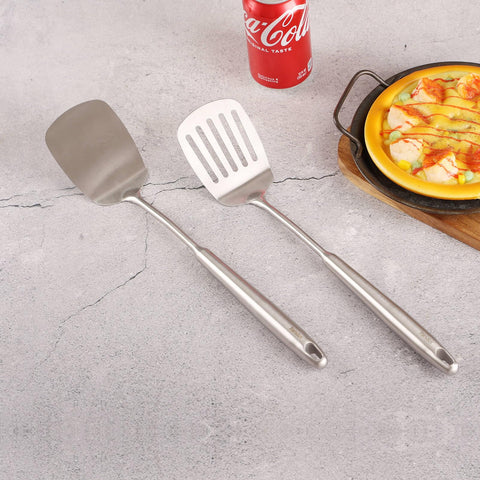 Standcn grease-drain slotted spatula reduces mess during cooking