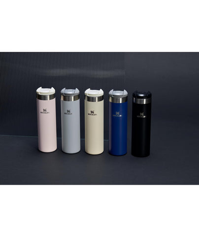 Stanley AeroLight Transit Bottle 20 oz fits car cup holders for easy road hydration.