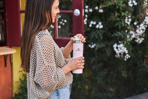Side view of the featherweight design on the Stanley AeroLight Transit Bottle for easy daily carry