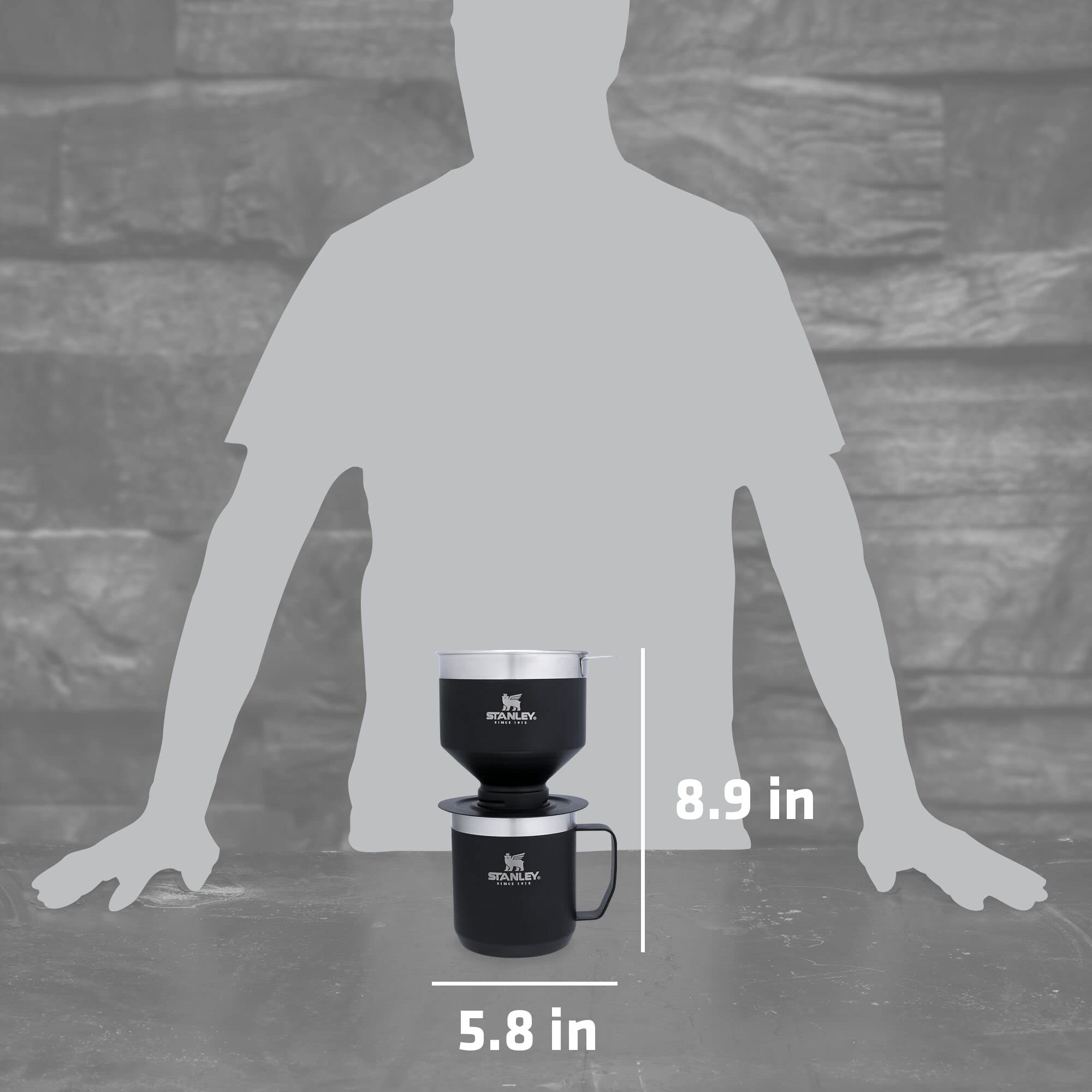 STANLEY camp mug with lid keeps coffee hot during adventures.