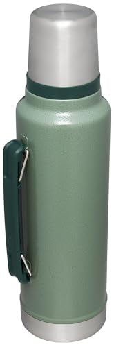 Stanley leakproof cup lid shown with bottle to prevent spills during travel.