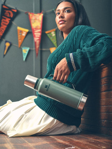 Compact Stanley Classic bottle packed for travel and on-the-go hydration