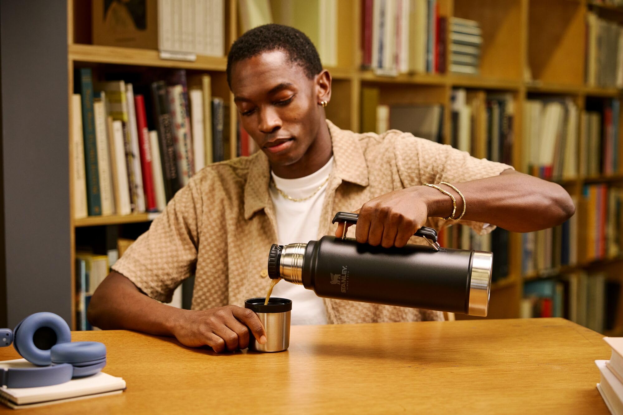 Wide mouth of Stanley vacuum bottle for easy filling and pouring into the cup lid