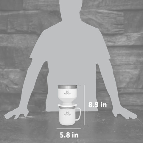 STANLEY insulated camp mug keeps beverages hot outdoors.