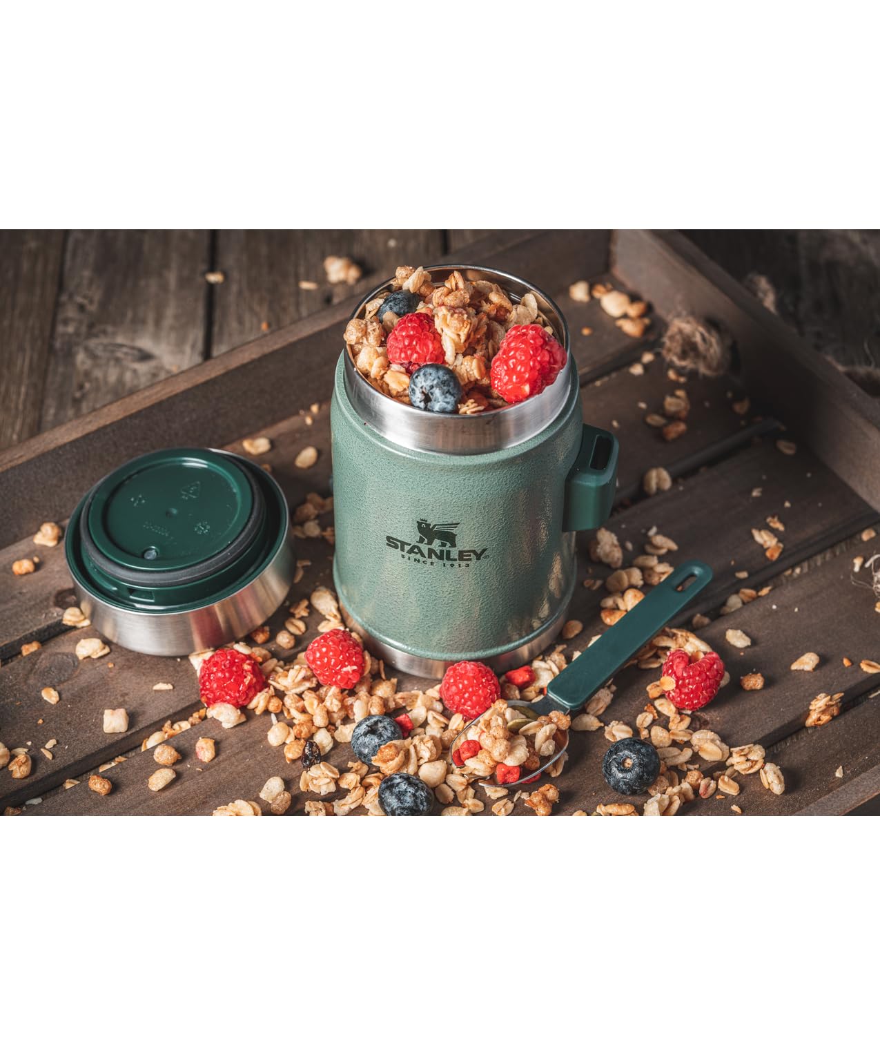 Insulated lid with pressure-release valve eases opening at camp.