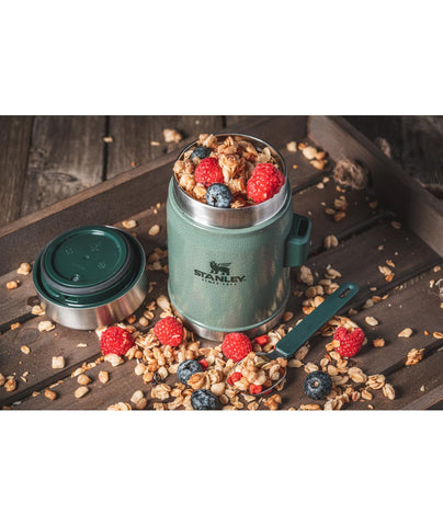 Insulated lid with pressure-release valve eases opening at camp.