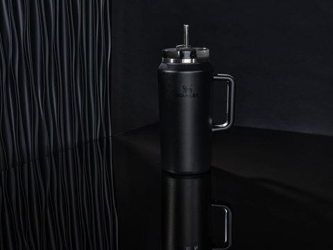 STANLEY Quencher 64oz capacity reduces refills during trips and long workouts.
