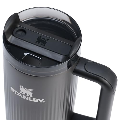 Stanley Quencher H2.0 FlowState lid shown in three-position, for spill-resistant sipping.