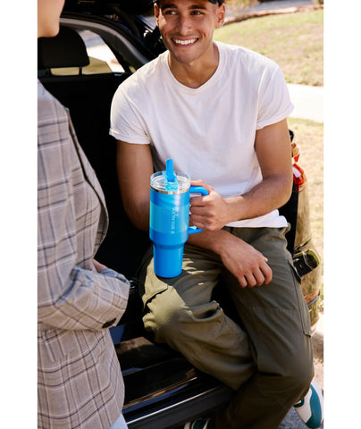 Stanley Quencher ProTour fits most car cup holders for travel convenience.