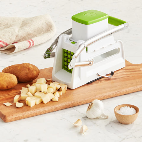 Starfrit Pro Fry Cutter & Cuber slices vegetables into uniform slices for even cooking.