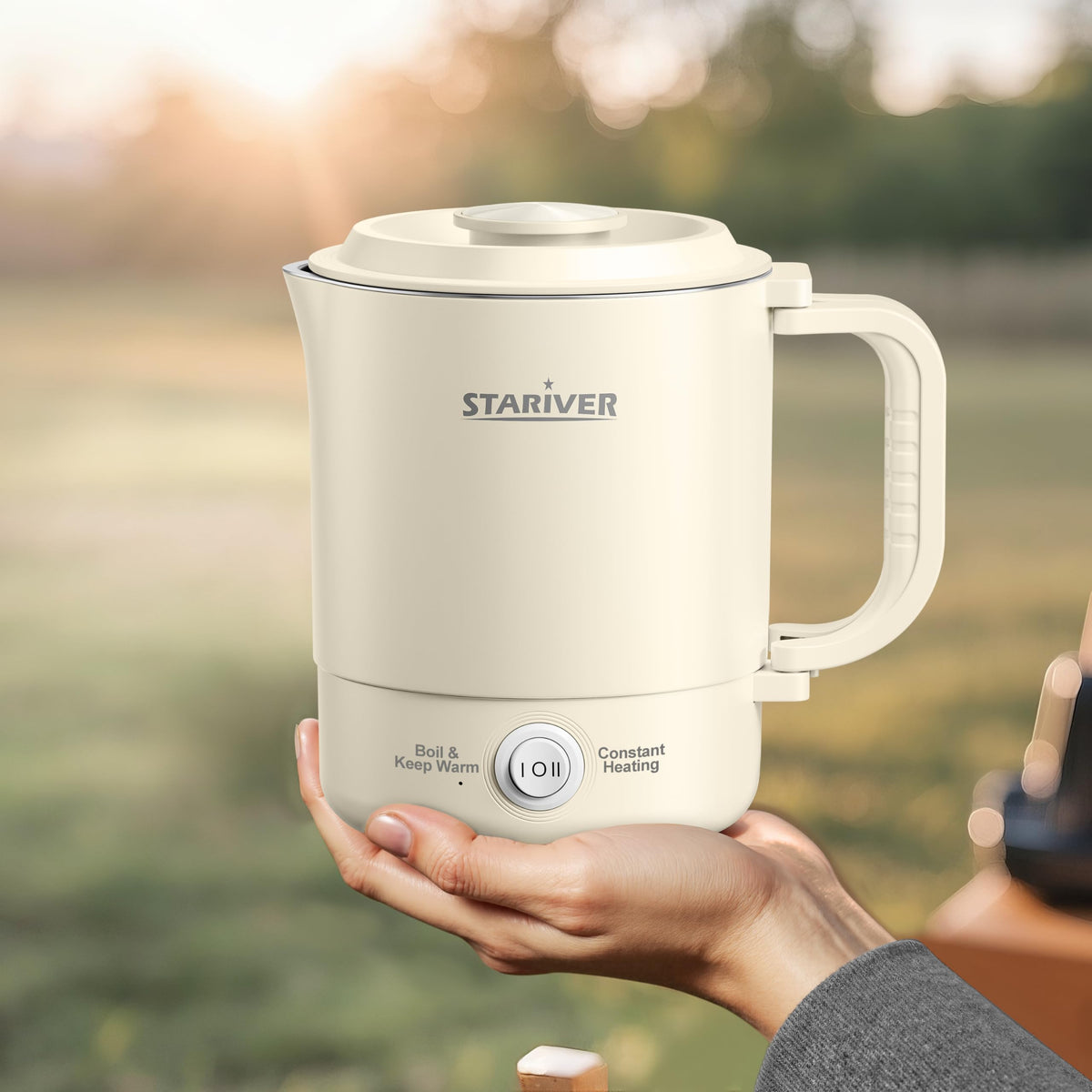Stariver travel kettle with foldable handle for easy packing on the go.