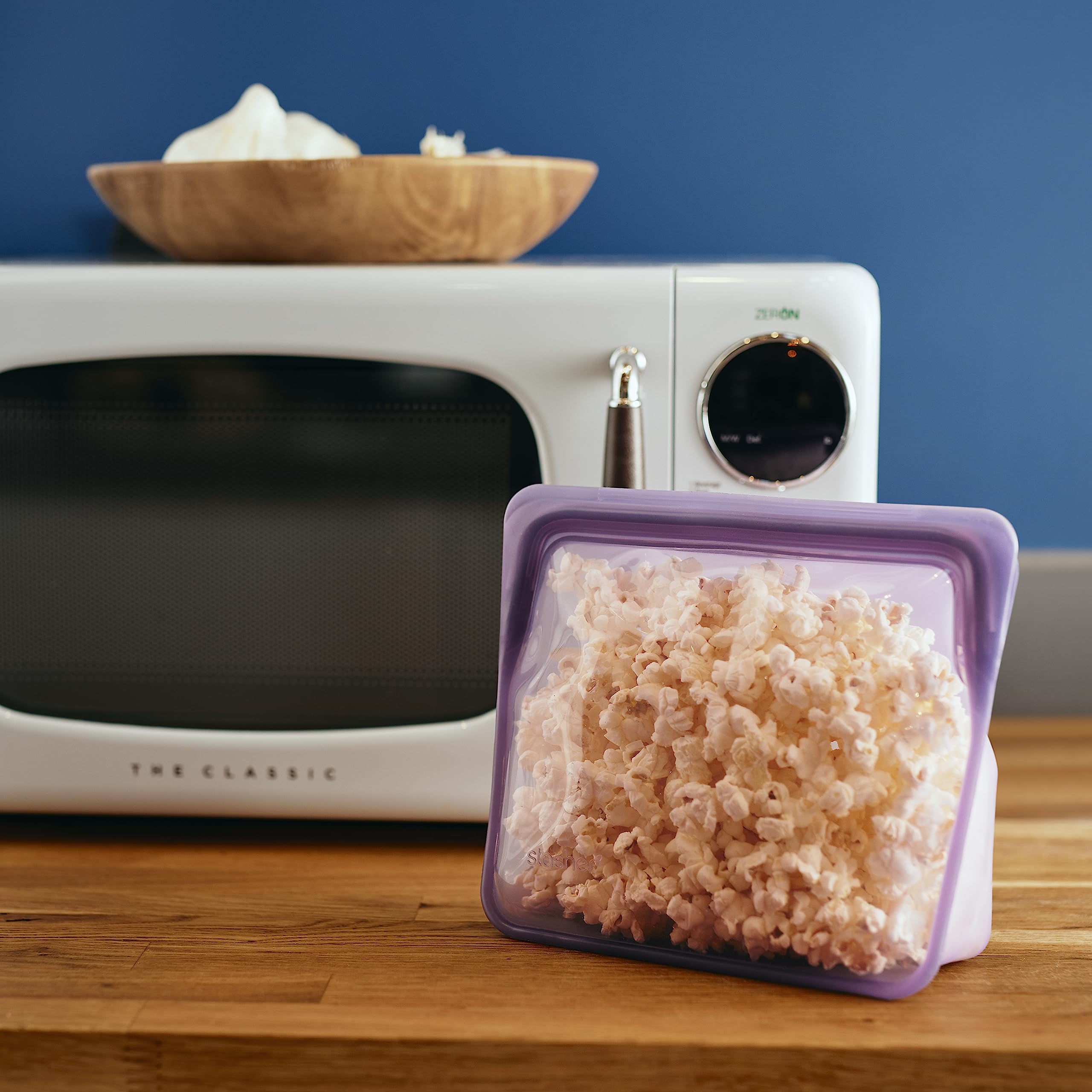 Stasher Premium Aqua Stand-Up Mid Bag for bulk freezer storage keeps contents organized.