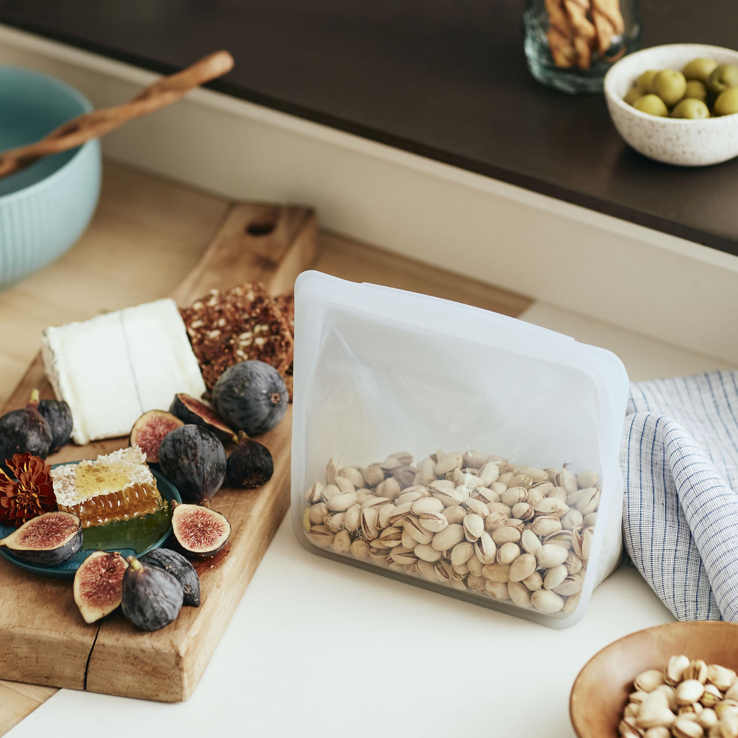 Stasher Premium Aqua Stand-Up Mid Bag used in microwave reheating for quick meals.