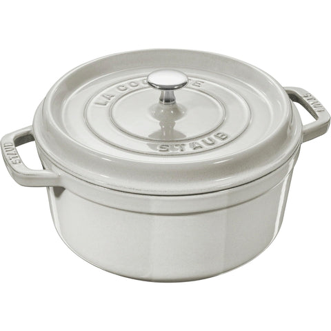 STAUB 4-qt round cocotte White Truffle enamel for even browning and rich flavor.