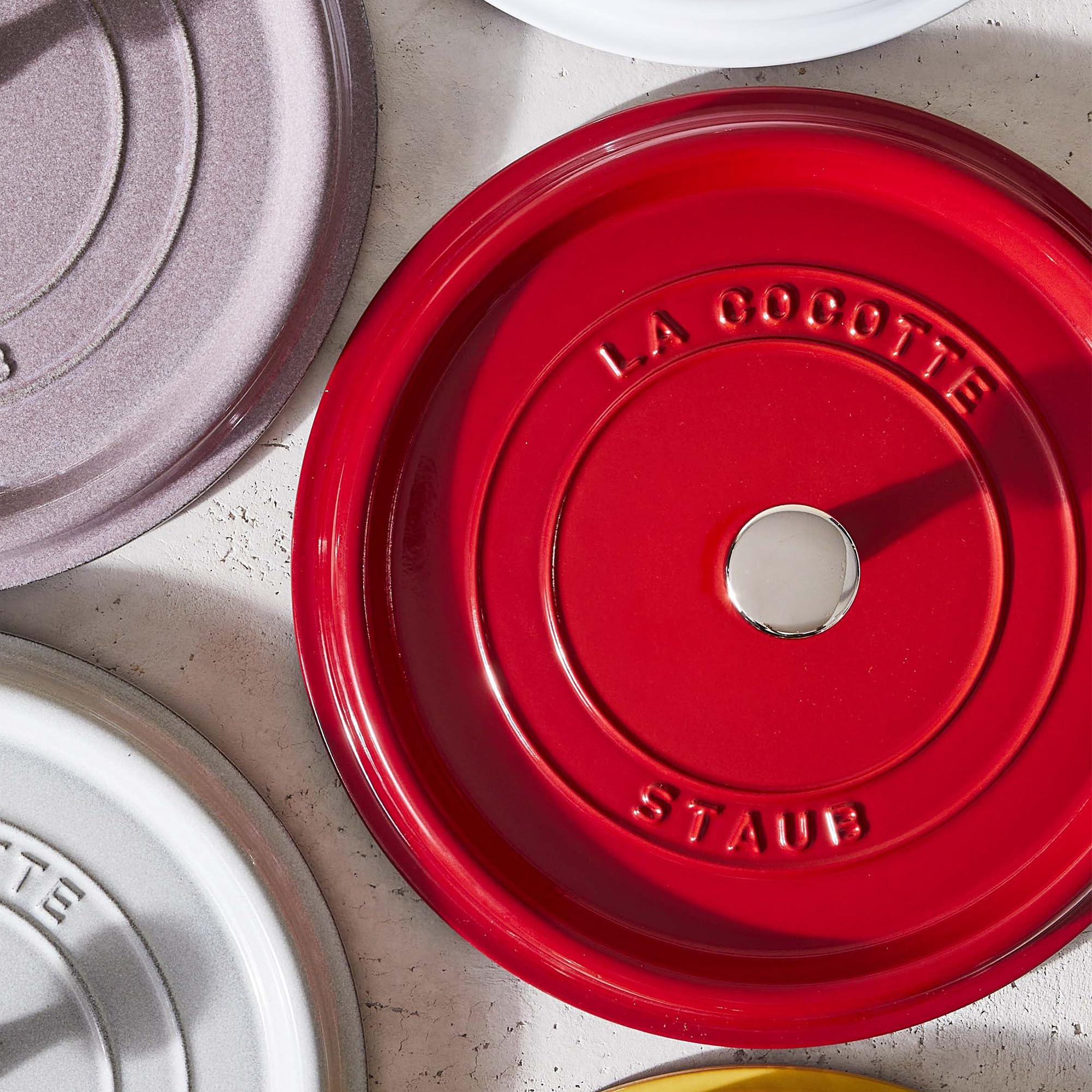 STAUB nickel knob offers durable comfortable grip and style.