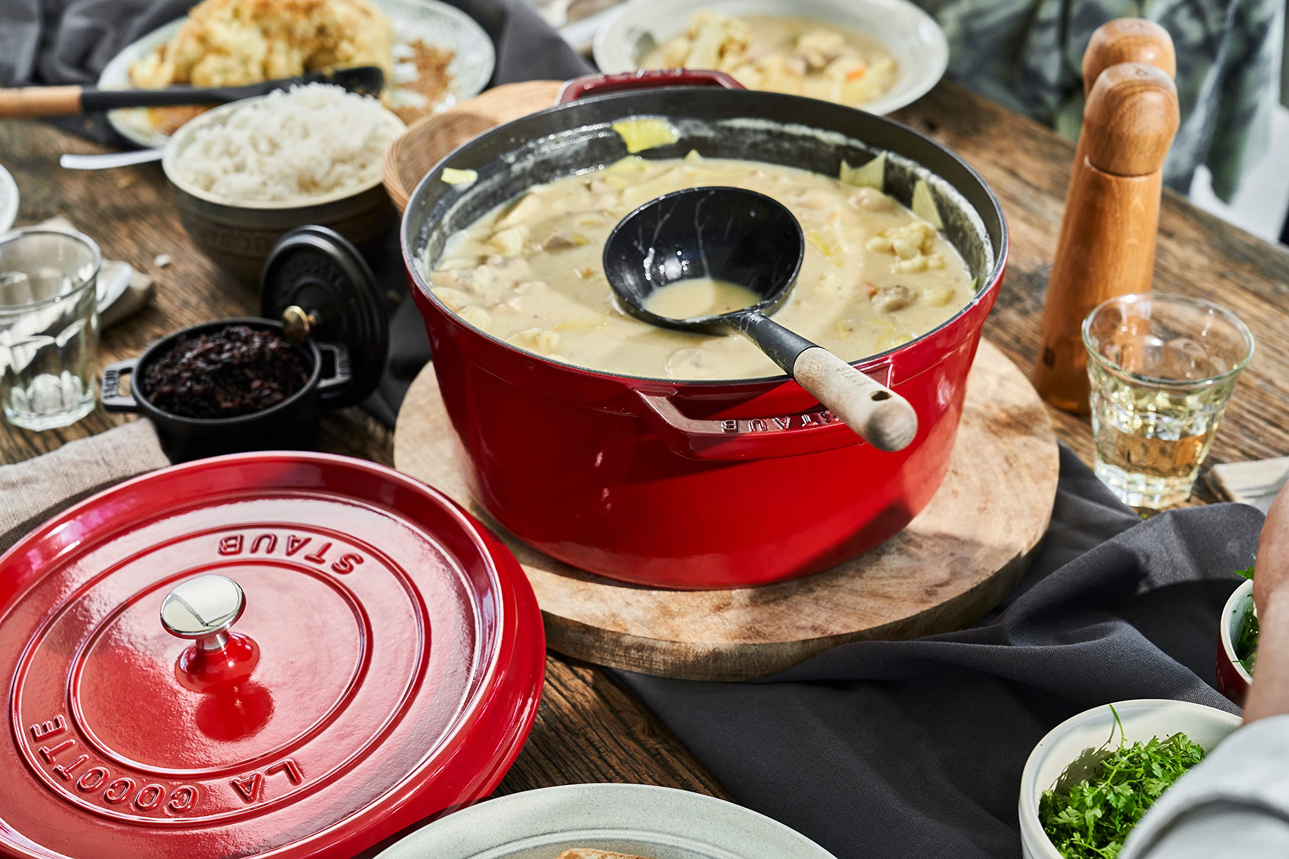 STAUB cherry lid with self-basting spikes for moisture-rich cooking.