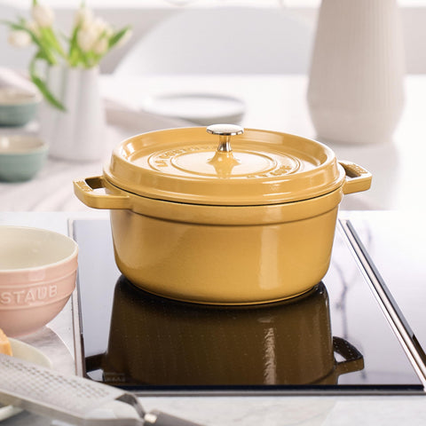 Staub 4-qt round oven citron interior-matte-finish promotes even browning.