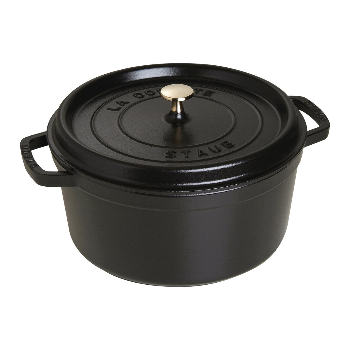 STAUB cast-iron Dutch oven 7qt round body highlights even heat for uniform cooking.