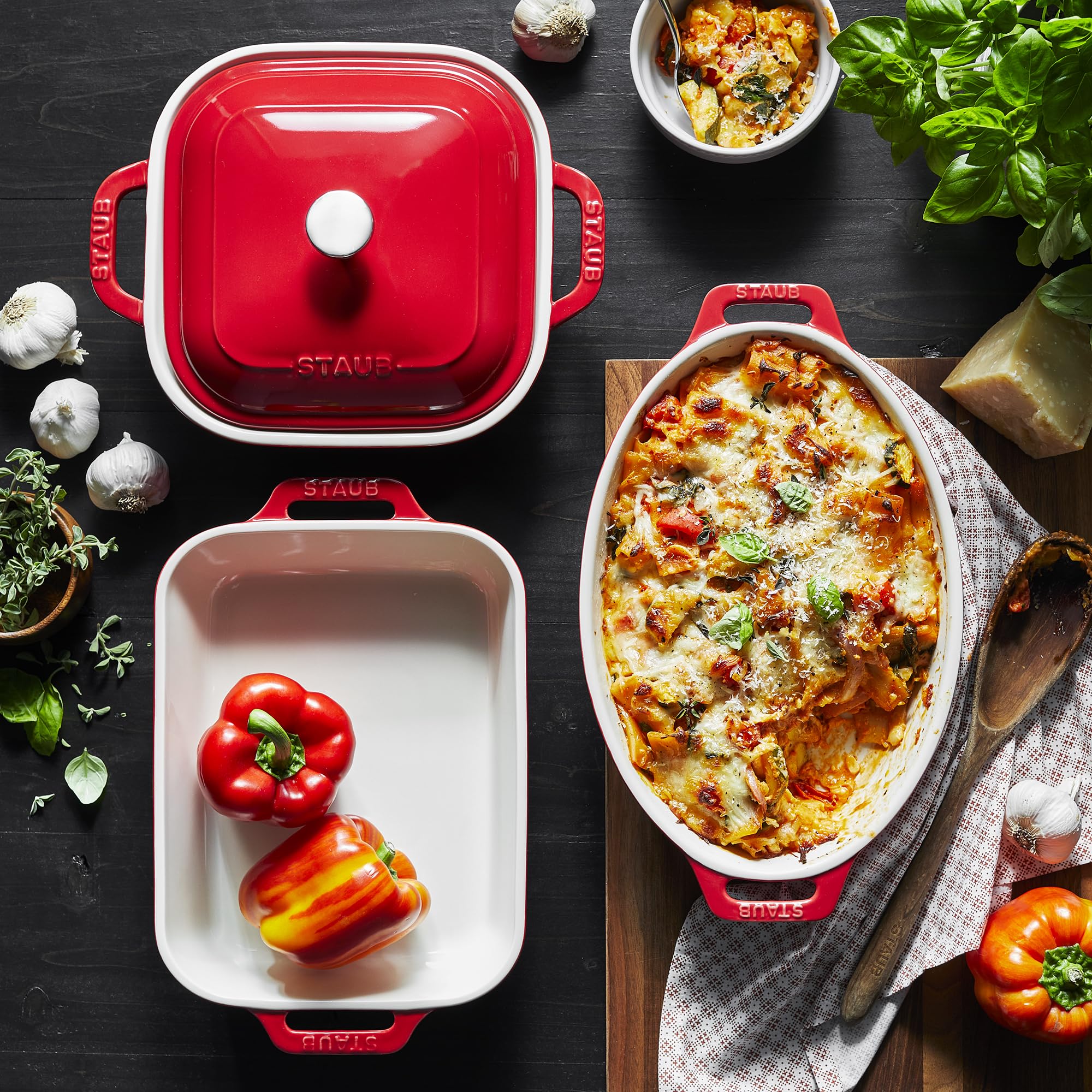 STAUB square 9x9 baker with lid, keeps heat for serving.