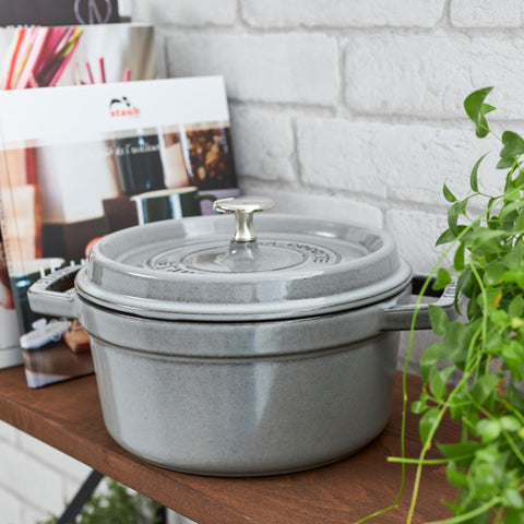 Staub bottom design supports induction cooktops for versatile heating.