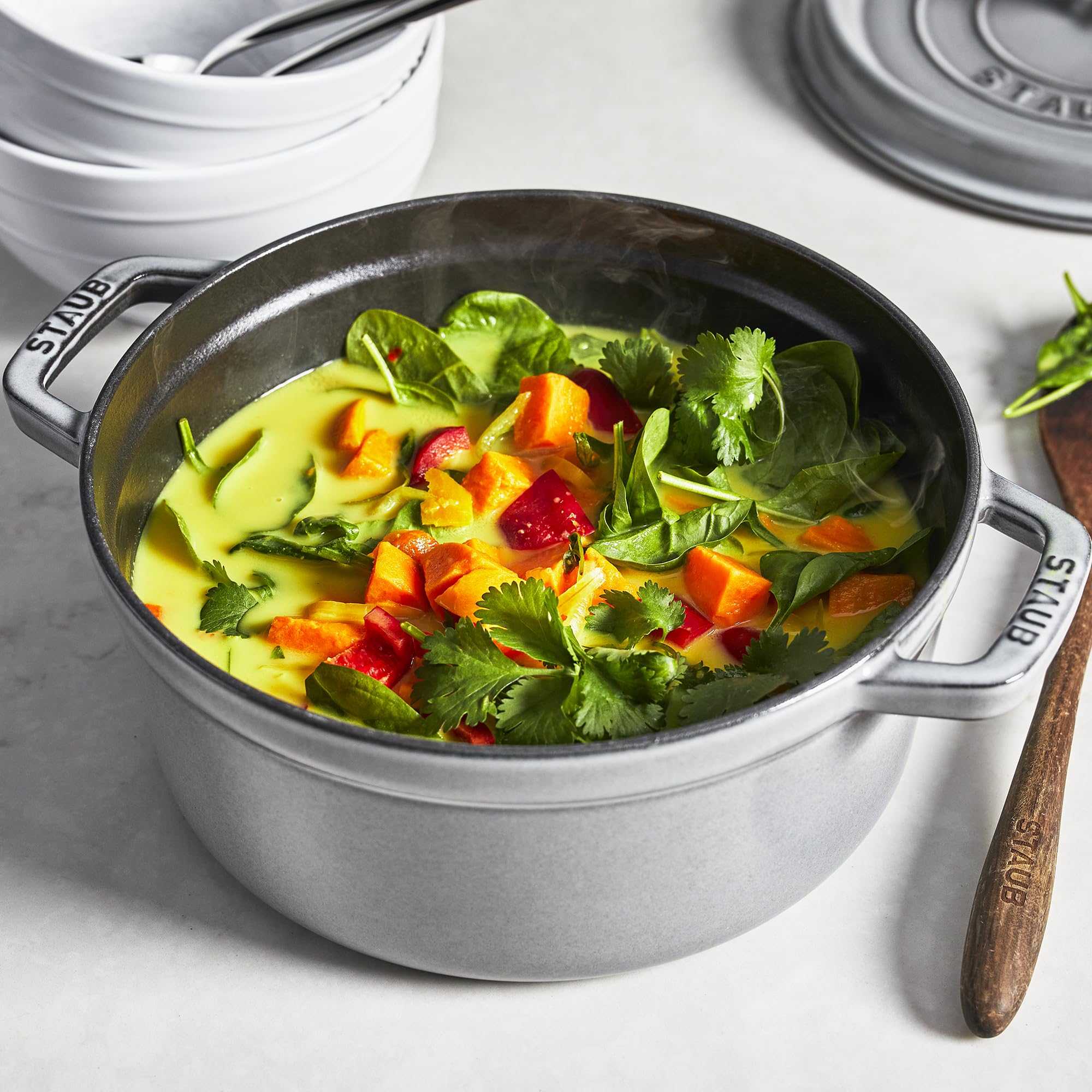 Staub heat-resistant knob up to 500F ensures safe handling.