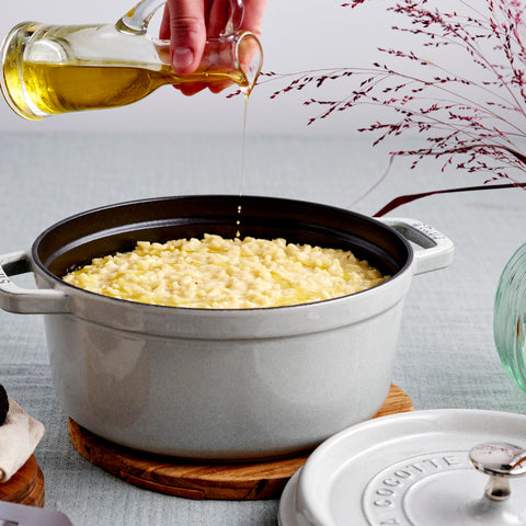 STAUB cocotte oven-safe up to 500°F for finishing dishes.