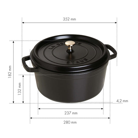 STAUB lid close-up shows high-heat tolerance up to 500F for versatile cooking.