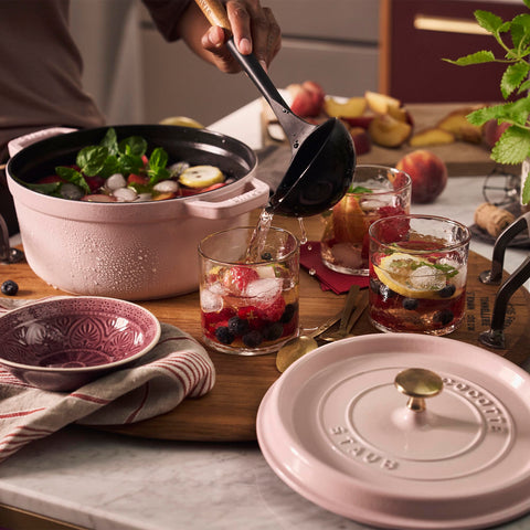 Staub Peony Pink Dutch Oven with lid on ensures moist, braised results.