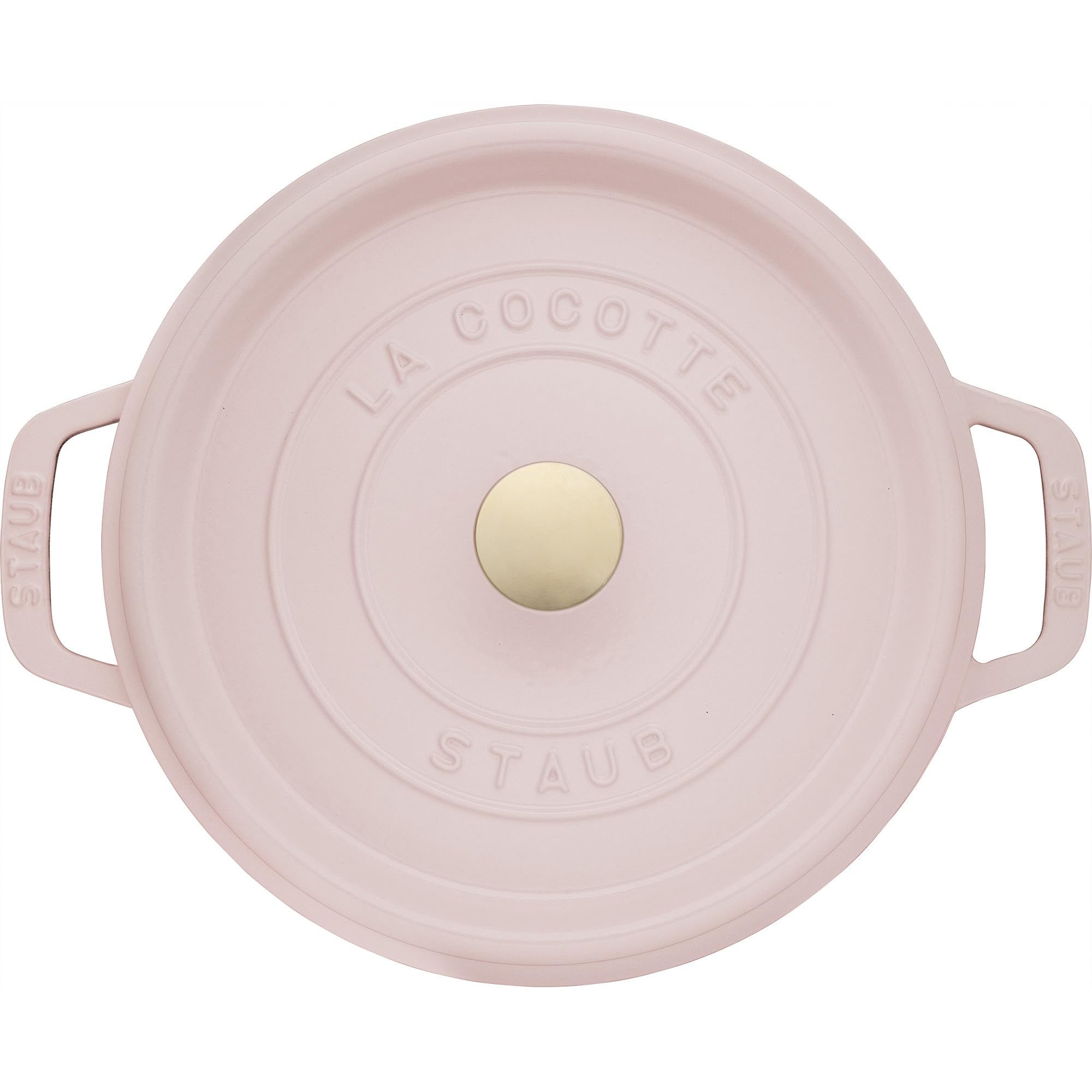 Staub Peony Pink on stovetop works across gas, electric, ceramic, and induction.