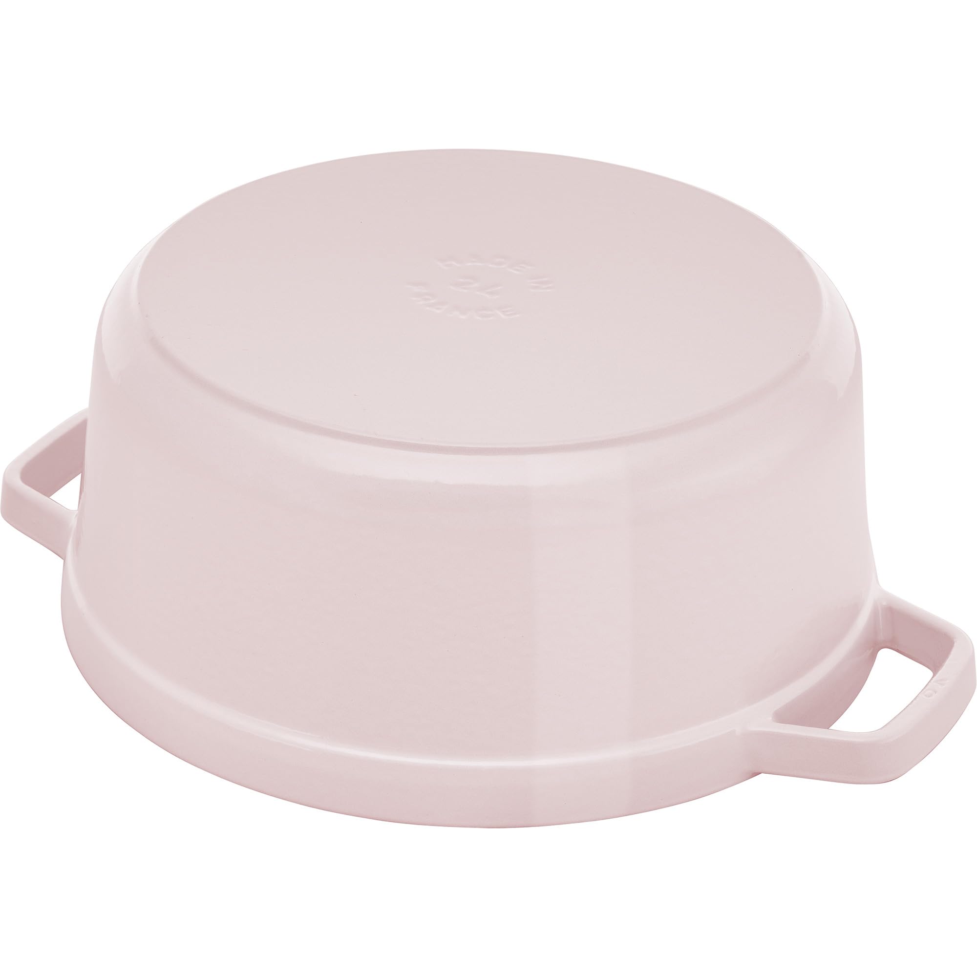 Staub Peony Pink oven-safe up to 900°F showcases high-heat cooking versatility.