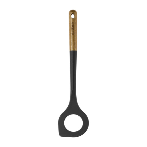STAUB risotto spoon with rounded edge designed to reach pot corners.