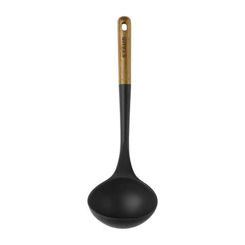 STAUB silicone ladle safe for nonstick surfaces and easy cleaning.