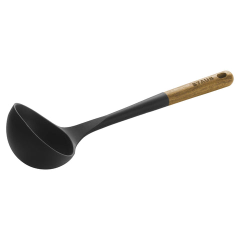 STAUB silicone soup ladle with matte black finish for hot soups and sauces.