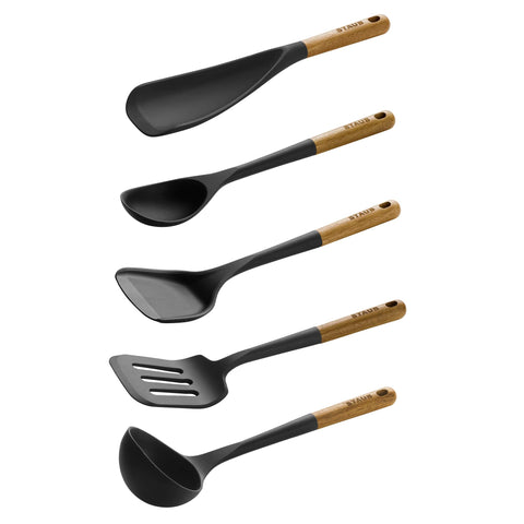 STAUB slotted serving turner with wood handle, ideal for draining and serving.