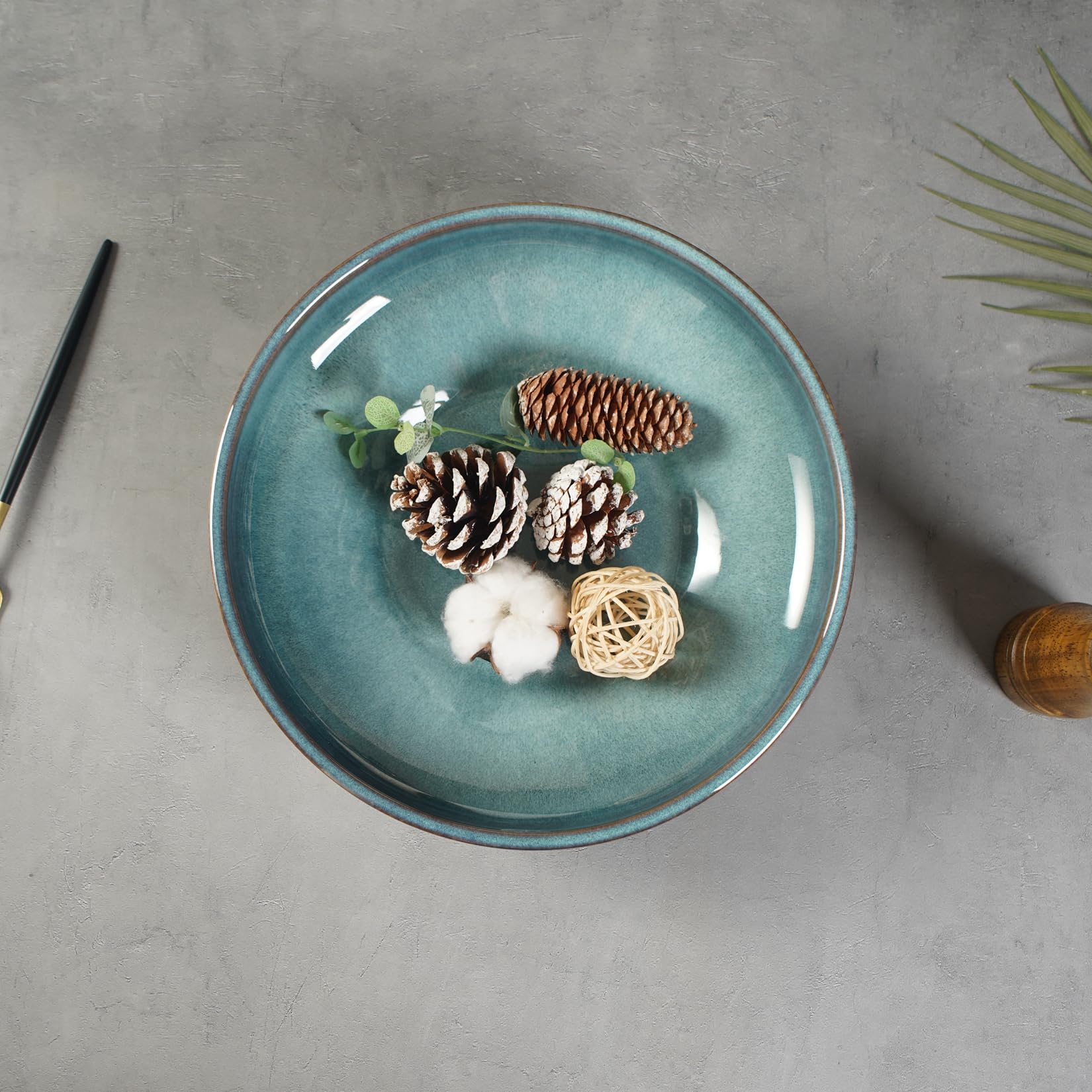 STE-CER ceramic bowl on countertop holds fruits and snacks neatly.