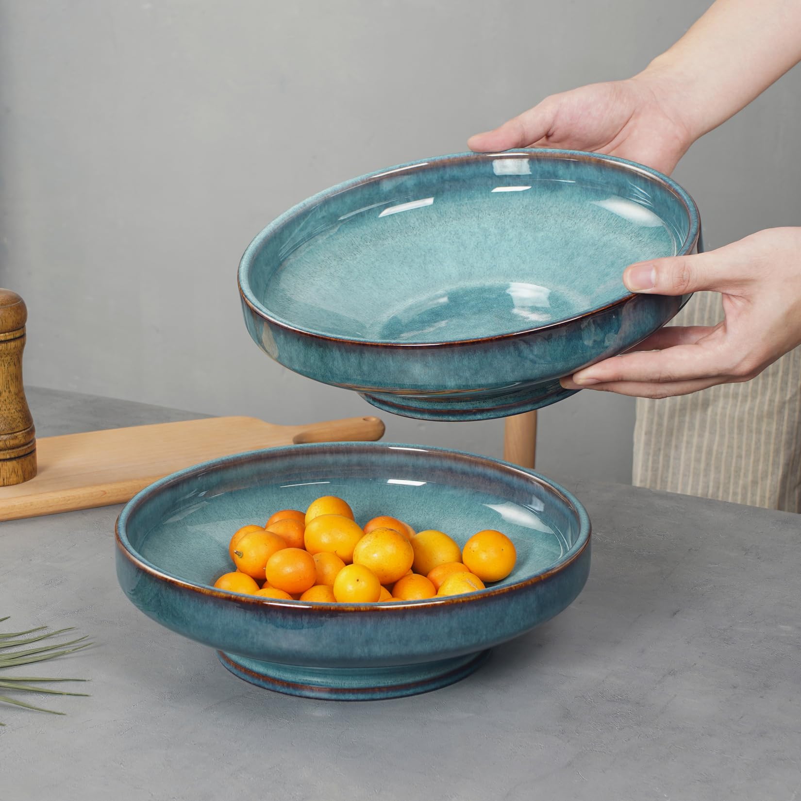 STE-CER blue footed bowl features smooth glaze for easy cleaning.