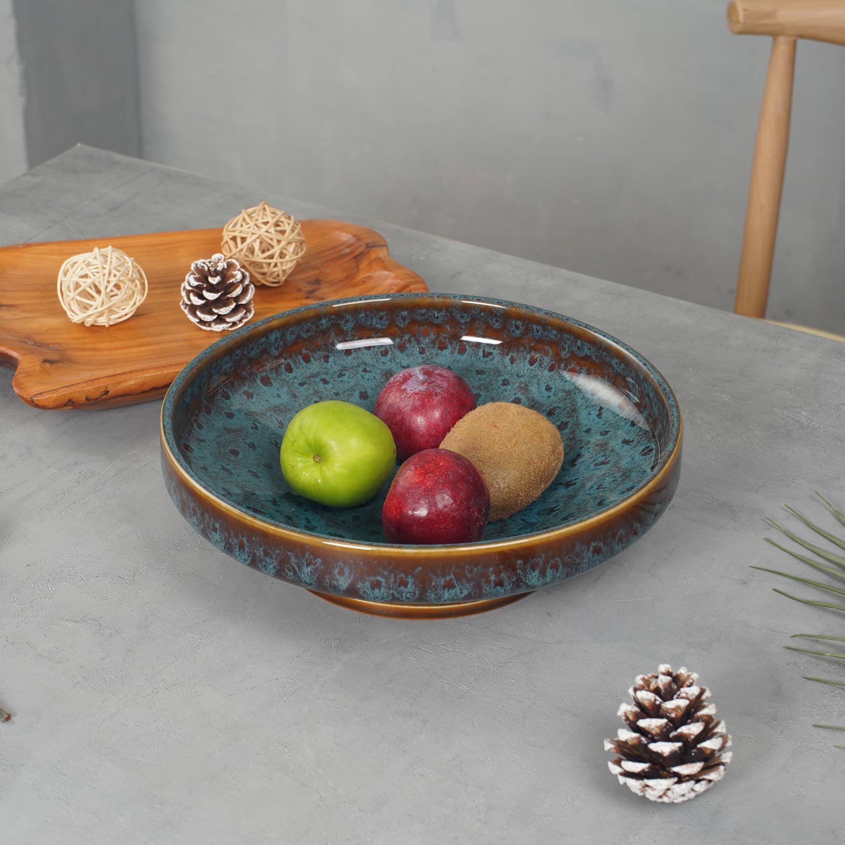 STE-CER Peacock Green pedestal fruit bowl, side view, ideal centerpiece accent.