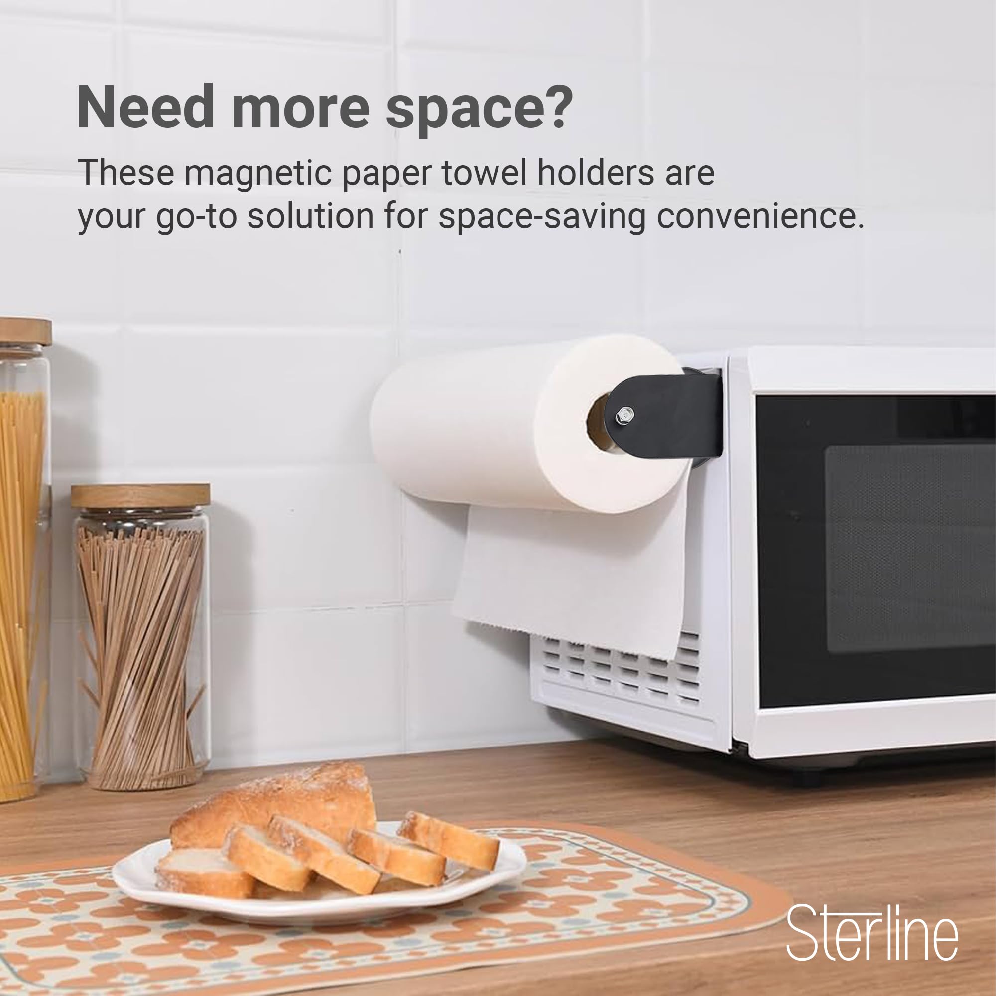 Sterline magnetic paper towel holder mounted on a grill for cleanup between cooks.