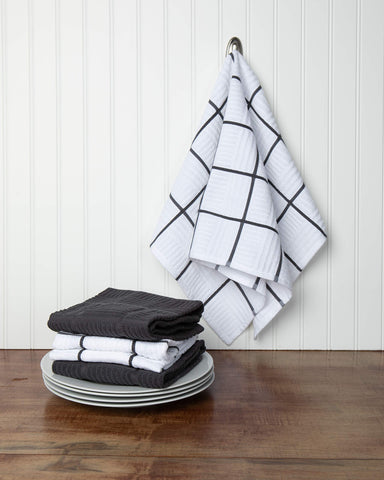 Sticky Toffee towels set4 gray-white absorbent close-up showing rapid moisture pickup.