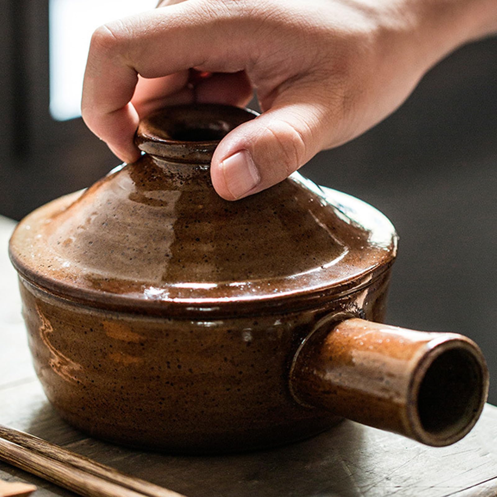 Stoneware Wave Microwave Cooker single-serving design fits most microwaves.
