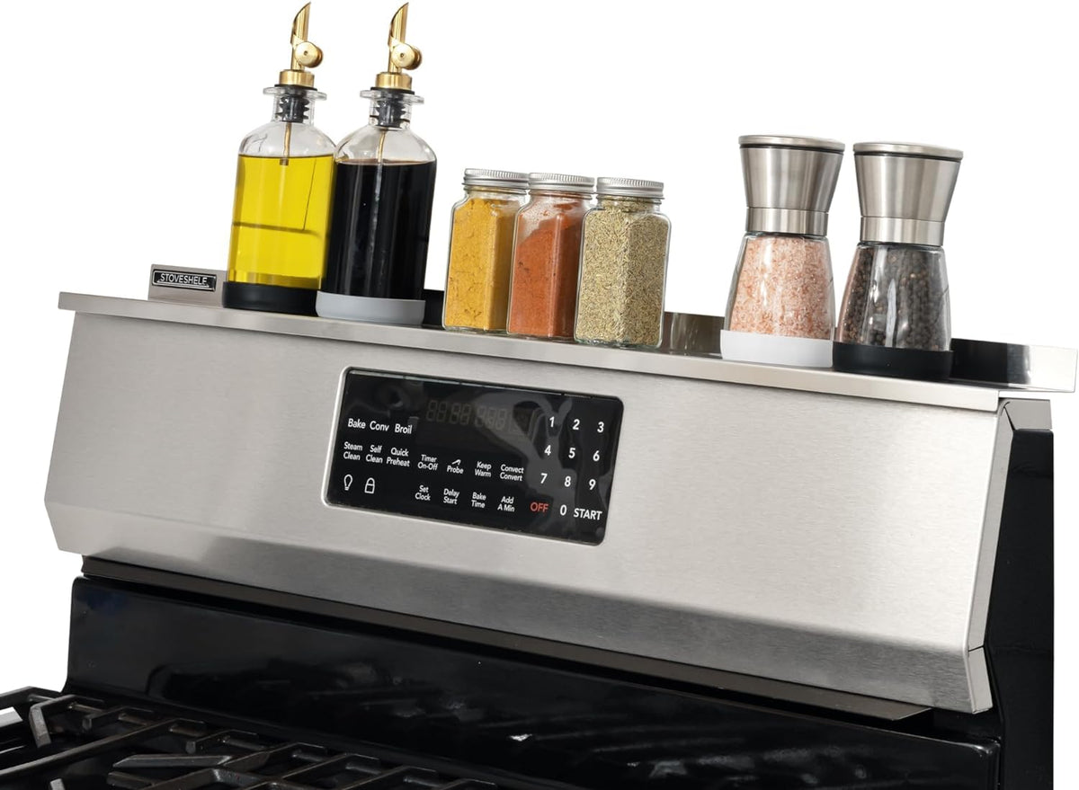 StoveShelf on a stainless stove top, showcasing easy spice storage.