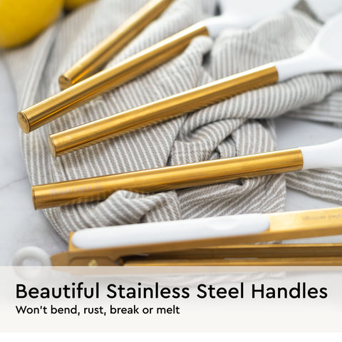 STYLED SETTINGS gold utensils set on display with white decor, complements modern kitchen design.