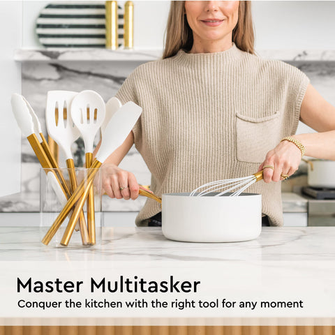 STYLED SETTINGS gold solid spoon front view, versatile for stirring, serving, and sautéing.