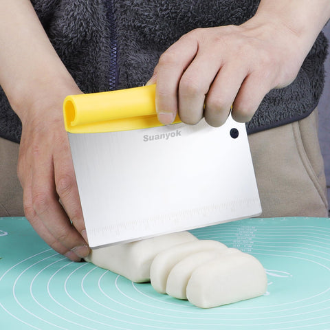 Suanyok flexible plastic dough scraper with handle for easy dough removal from bowls.