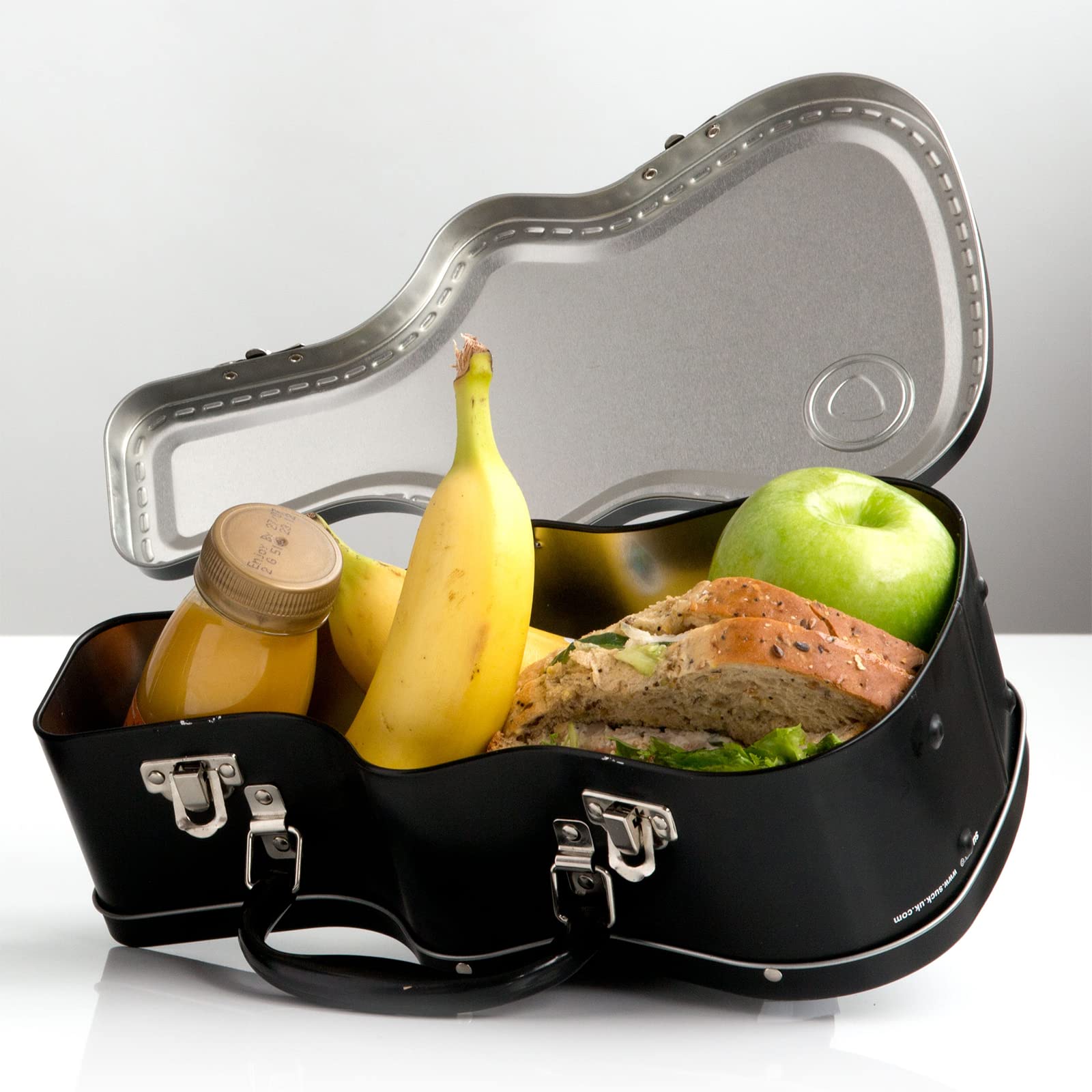 Suck UK guitar lunch box open lid reveals roomy interior for snacks.