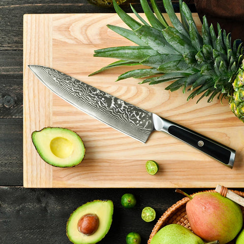 Sunnecko knife displayed on a cutting board showcasing its all-purpose design.