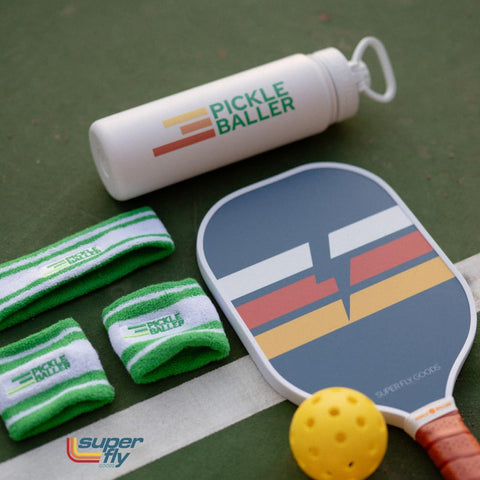 Super Fly Goods Dink Responsibly tumbler outdoor scene captures poolside or park relaxation with style