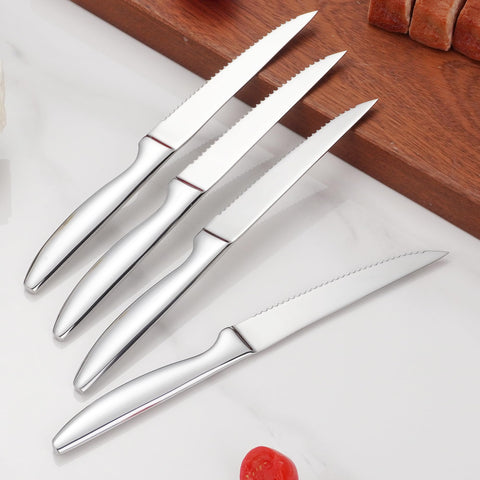SuperCook knife set shown on a dining table display for entertaining meals